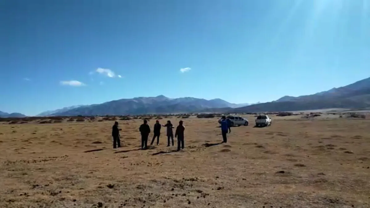 Screenshot of a video going viral in Ladakh shows a Chinese (two vehicles inset) incursion on the Cakzung pastures in Indian territory on Dec. 16. The Chinese retreated after being confronted by Indian officials. (Video courtesy Kunchok Stanzin)