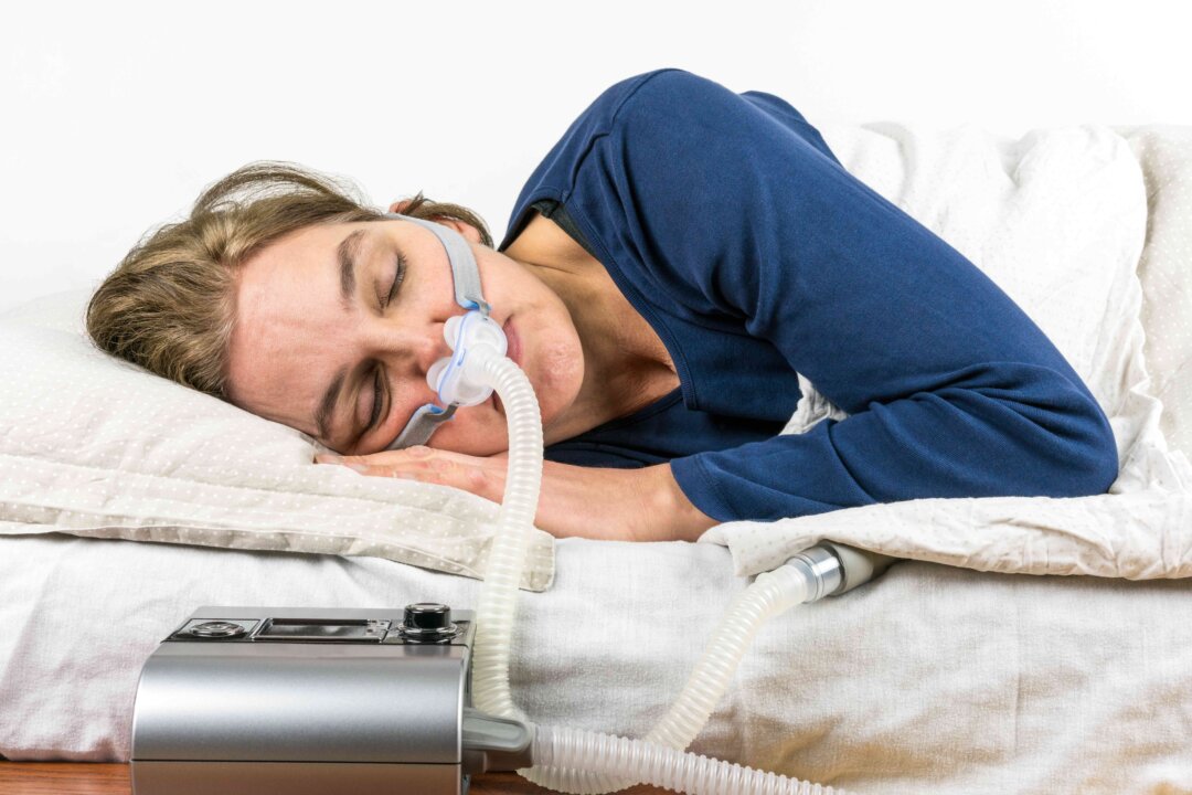 A positive airway pressure (PAP) device helps those suffering sleep apnea get a better night's rest. (Per-Boge/Shutterstock)