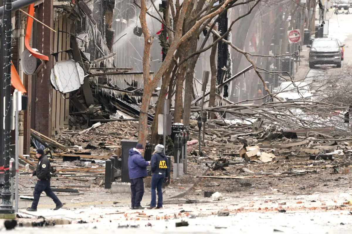 Emergency personnel work near the scene of an explosion in downtown Nashville, Tenn., on Dec. 25, 2020. (Mark Humphrey/AP Photo)