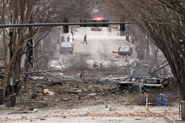 Emergency personnel work near the scene