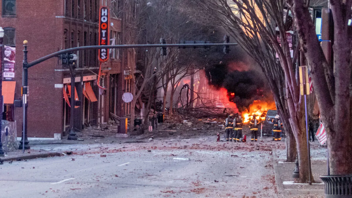Debris litters the road near the site of an explosion in the area of Second and Commerce in Nashville, Tenn., on Dec. 25, 2020. (Elliott Anderson/Tennessean.com/USA Today via Reuters)