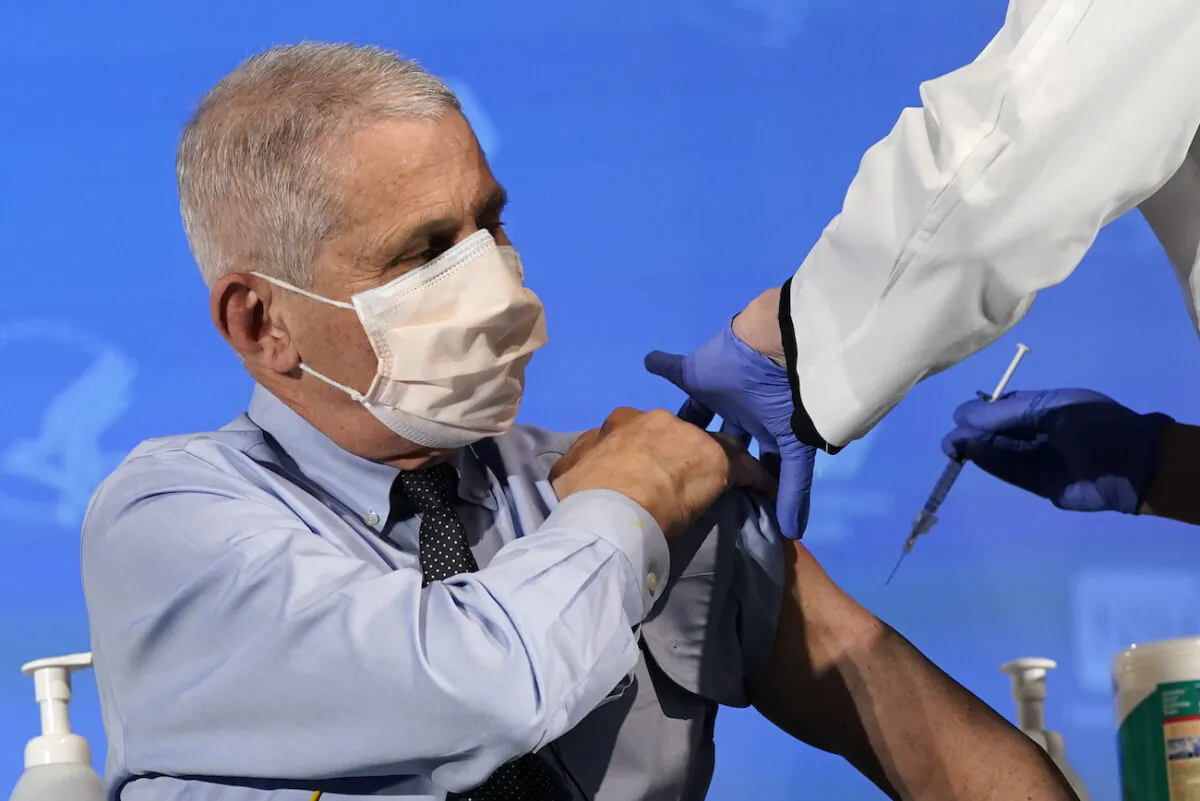 Dr. Anthony Fauci, director of the National Institute of Allergy and Infectious Diseases, prepares to receive his first dose of Moderna's COVID-19 vaccine at the National Institutes of Health in Bethesda, Md., on Dec. 22, 2020. (Patrick Semansky/Getty Images)