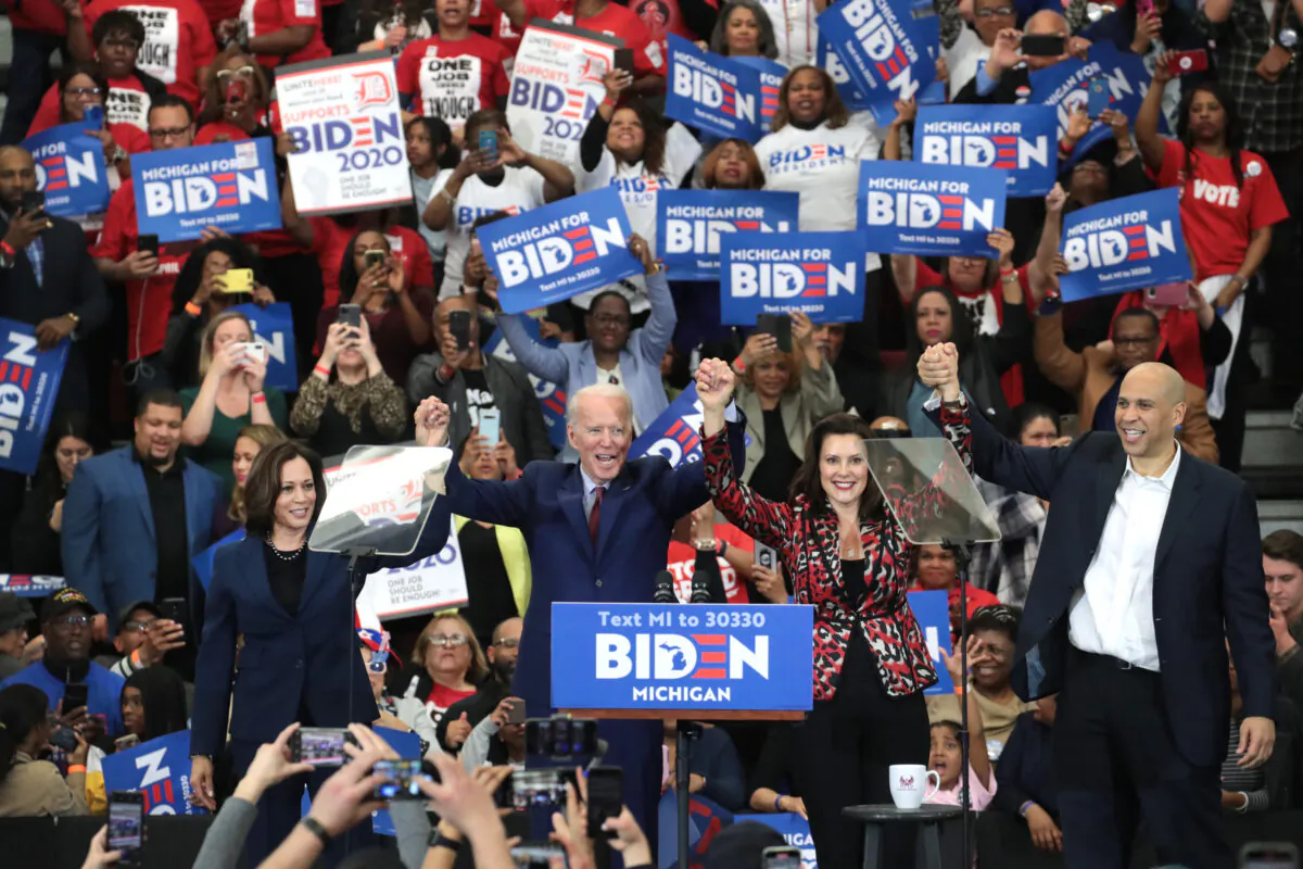 From left to right, Sen. Kamala Harris (D-Calif.), Democratic presidential nominee Joe Biden, Michigan Gov. Gretchen Whitmer, and Sen. Cory Booker (D-N.J.) at a rally in Detroit, Mich., on March 9, 2020. (Scott Olson/Getty Images)