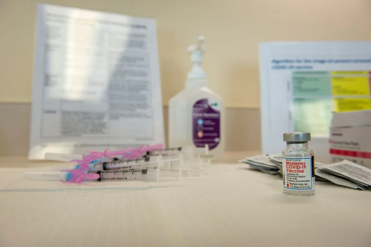 The Moderna COVID-19 vaccine and syringes stand ready on a table for use in Boston, Mass., on Dec. 24, 2020. (Joseph Prezioso/AFP via Getty Images)