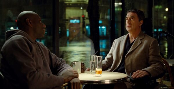 black man dining with white parapaligic