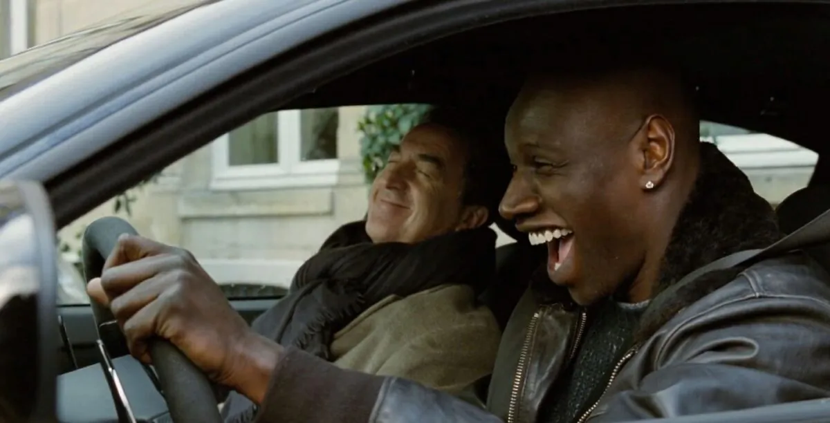 Philippe (François Cluzet) and Griss (Omar Sy) bond despite their differences, in “The Intouchables.” (The Weinstein Company)