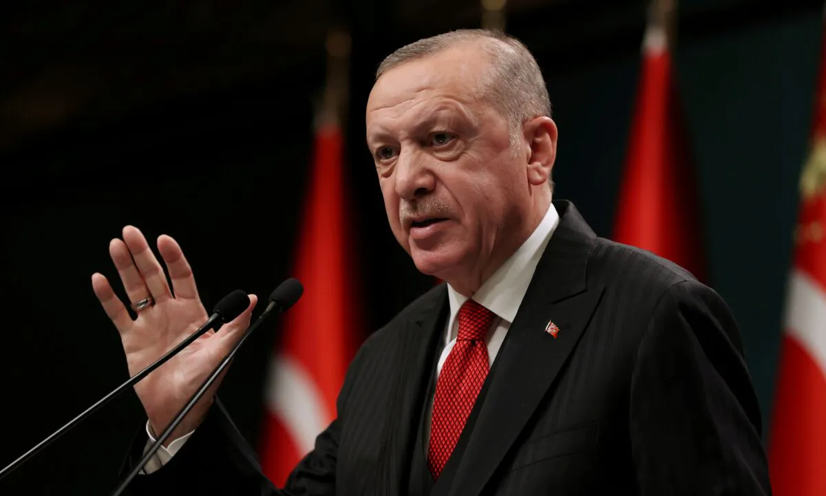 Turkish President Tayyip Erdogan talks during a news conference following a cabinet meeting in Ankara, Turkey, on Nov. 30, 2020. (Presidential Press Office/Handout via Reuters)