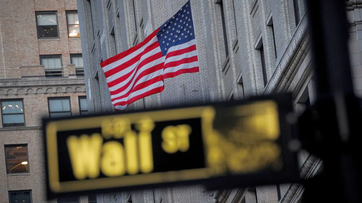 The U.S. flag is seen on a building on Wall Street in the financial district in New York on Nov. 24, 2020. (Brendan McDermid/Reuters)