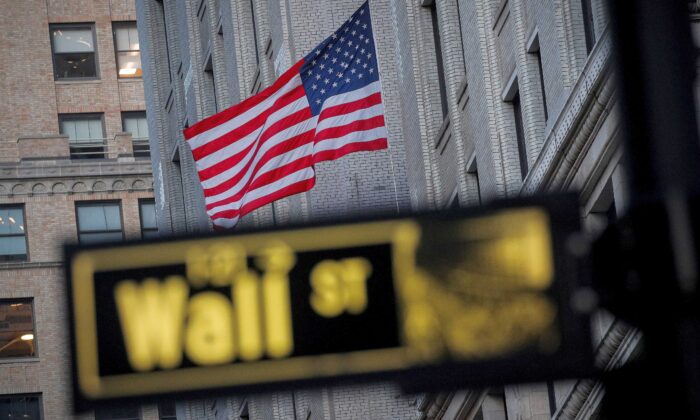 The U.S. flag is seen on a building on Wall Street in the financial district in New York on Nov. 24, 2020. (Brendan McDermid/Reuters)