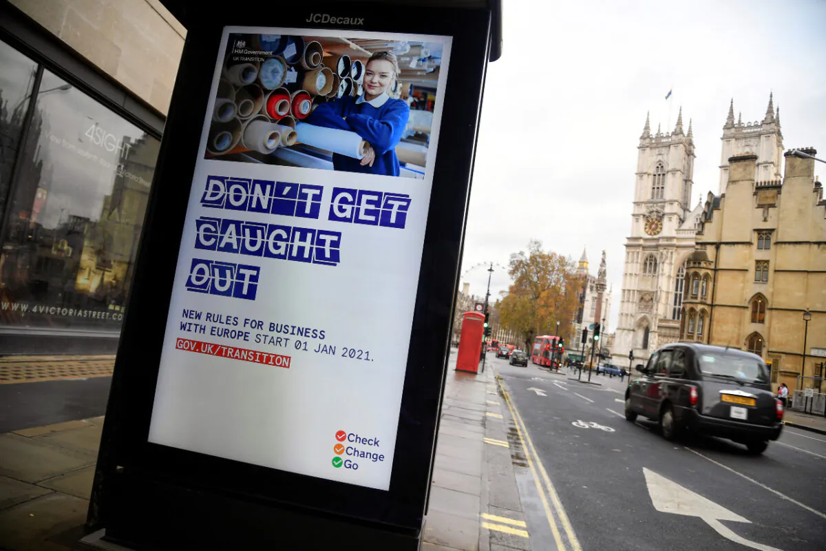 File photo shows an electronic billboard displaying a British government information message advising business to prepare for Brexit, in London on Dec. 4, 2020. (Reuters/Toby Melville)