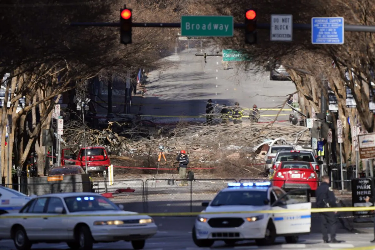 Investigators continue to examine the site of an explosion in Nashville, Tenn., on Dec. 27, 2020. (Mark Humphrey/AP Photo)