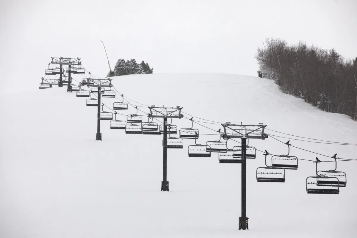 Idle chairlifts are seen on the shut-down slopes of Blue Mountain Ski Resort in The Blue Mountains, Ontario, Canada, on Dec. 26, 2020. (Cole Burston/The Canadian Press)