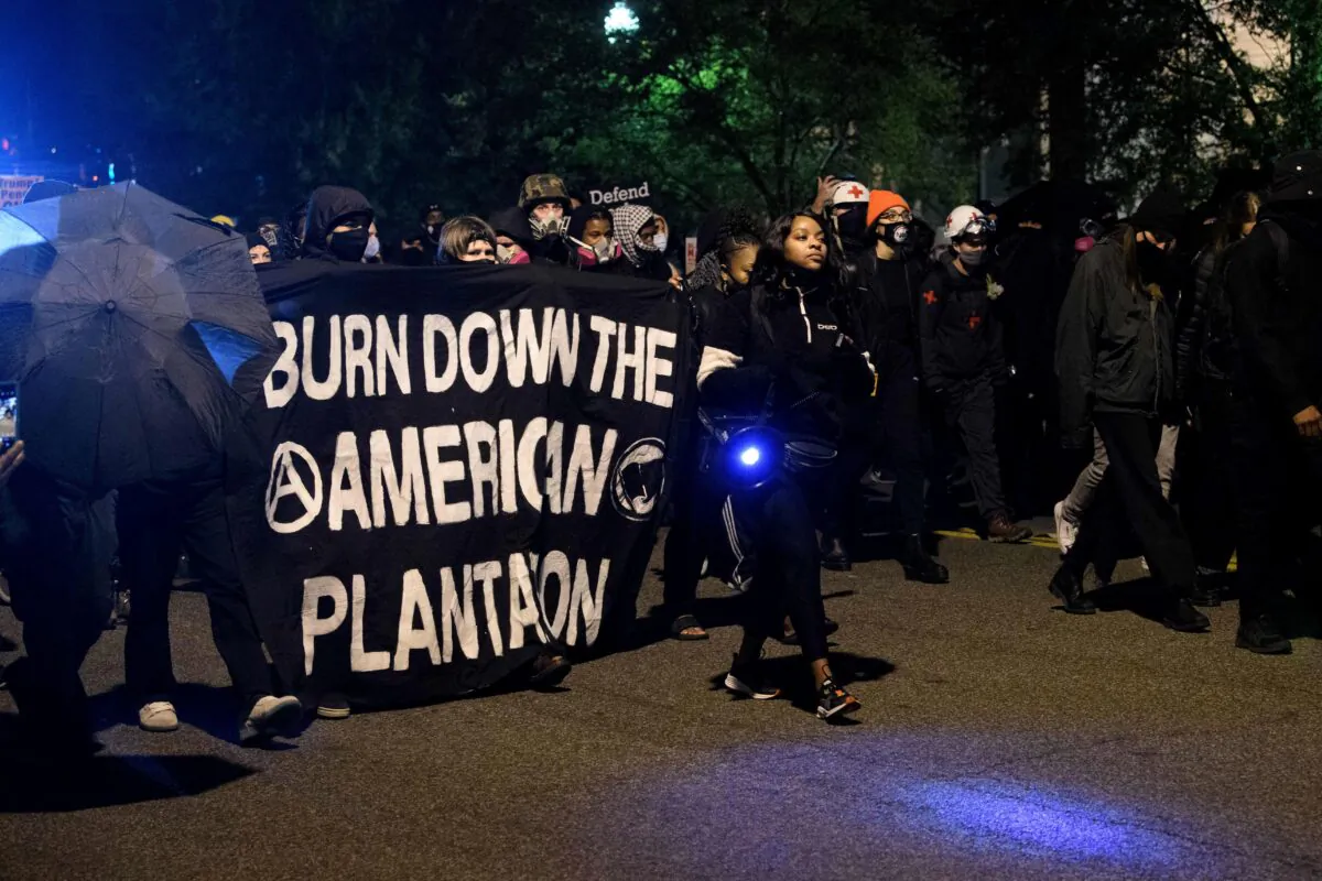 Antifa and Black Lives Matter demonstrators protest on election night near the White House in Washington, on Nov. 3, 2020. (Nicholas Kamm/AFP via Getty Images)