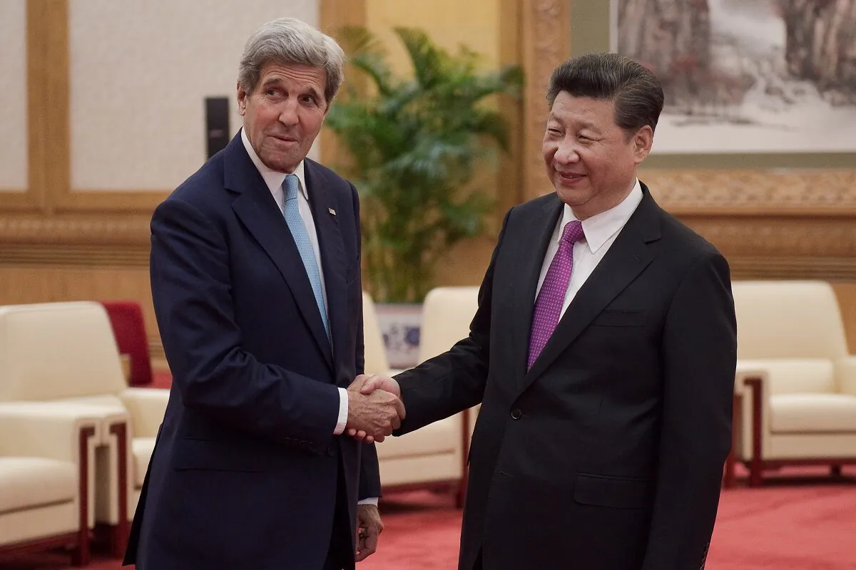 The then-U.S. Secretary of State John Kerry (L) shakes hands with Chinese leader Xi Jinping (R) at the Great Hall of the People at the end of the eighth round of U.S-China strategic and economic dialogues in Beijing, China on June 7, 2016. Kerry was in China for talks on a variety of issues including seeking diplomatic solutions for the South China Sea. (Nicolas Asfouri - Pool/Getty Images)