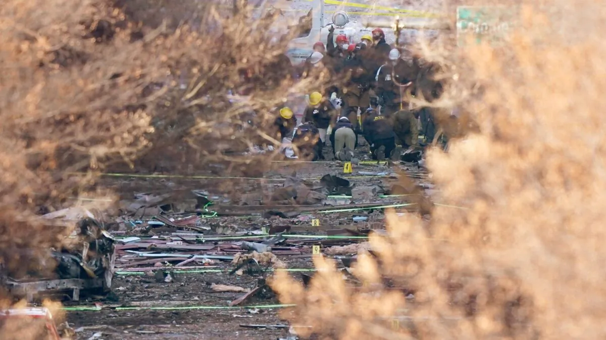 Investigators continue to look through the site of an explosion in Nashville, Tenn., on Dec. 28, 2020. (Mark Humphrey/AP Photo)