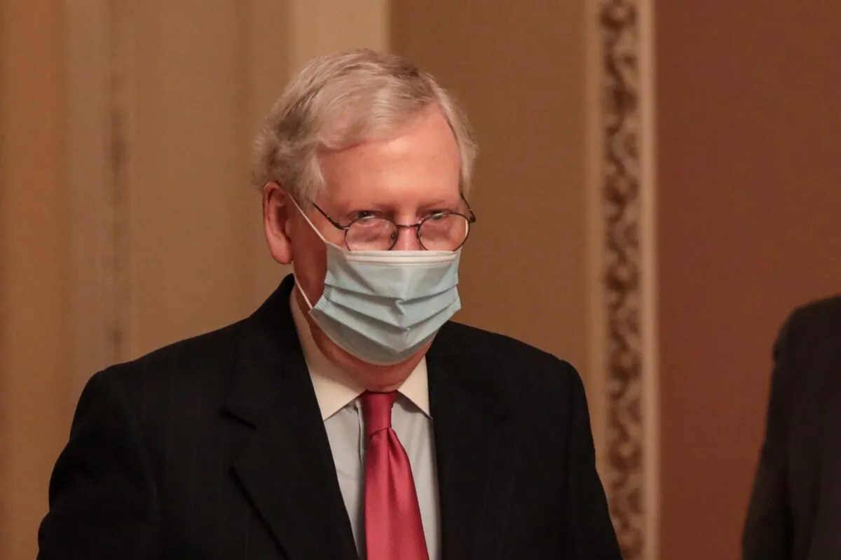 Senate Majority Leader Mitch McConnell (R-Ky.) walks in Washington on Dec. 21, 2020. (Cheriss May/Getty Images)
