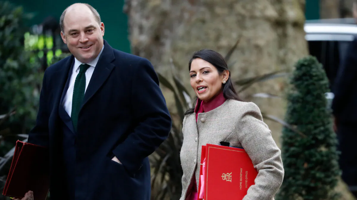 Britain's Home Secretary Priti Patel (R) and Defence Secretary Ben Wallace (L) arrive for a cabinet meeting at 10 Downing Street in central London on Feb. 14, 2020. (Tolga Akmen/AFP via Getty Images)