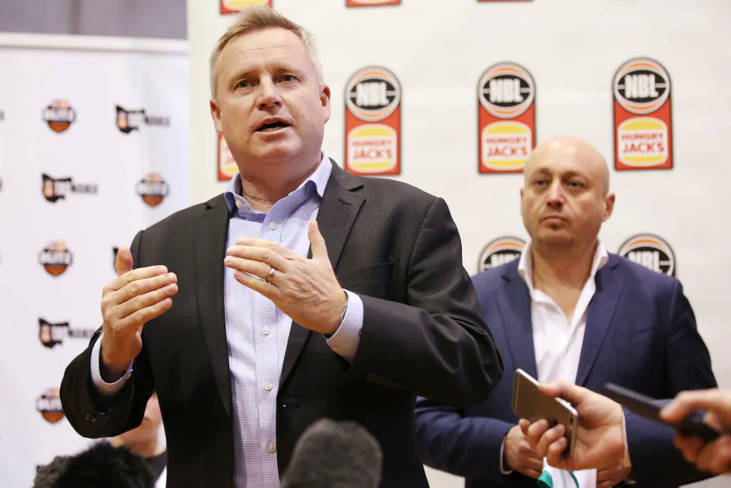 Tasmania Mental Health Minister Jeremy Rockliff with NBL executive director Larry Kestelman at Kingborough Sports Centre in Hobart, Australia on July 9, 2019. (Michael Dodge/Getty Images for the NBL)