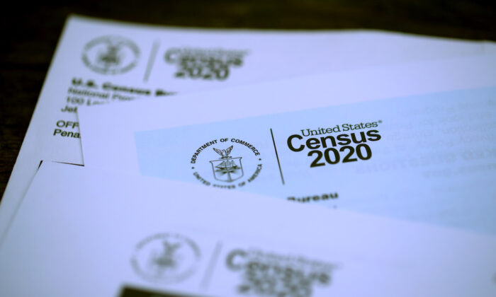 The U.S. Census logo appears on census materials received in the mail with an invitation to fill out census information online in San Anselmo, Calif., on March 19, 2020. (Justin Sullivan/Getty Images)