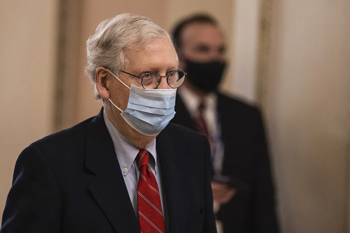 Senate Majority Leader Mitch McConnell (R-Ky.) walks to open up the senate on Capitol Hill in Washington, on Dec. 20, 2020. (Tasos Katopodis/Getty Images)