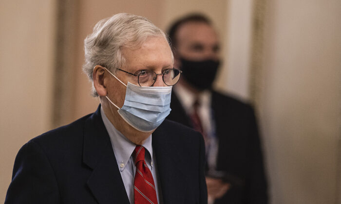Senate Majority Leader Mitch McConnell (R-Ky.) walks to open up the senate on Capitol Hill in Washington, on Dec. 20, 2020. (Tasos Katopodis/Getty Images)