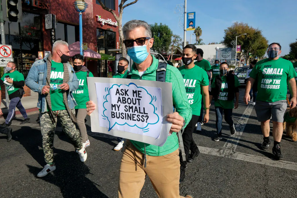 Small business owners and their supporters participate in a Save Small Business protest in Los Angeles, Calif., on Dec. 12, 2020. (Ringo Chiu/AFP via Getty Images)