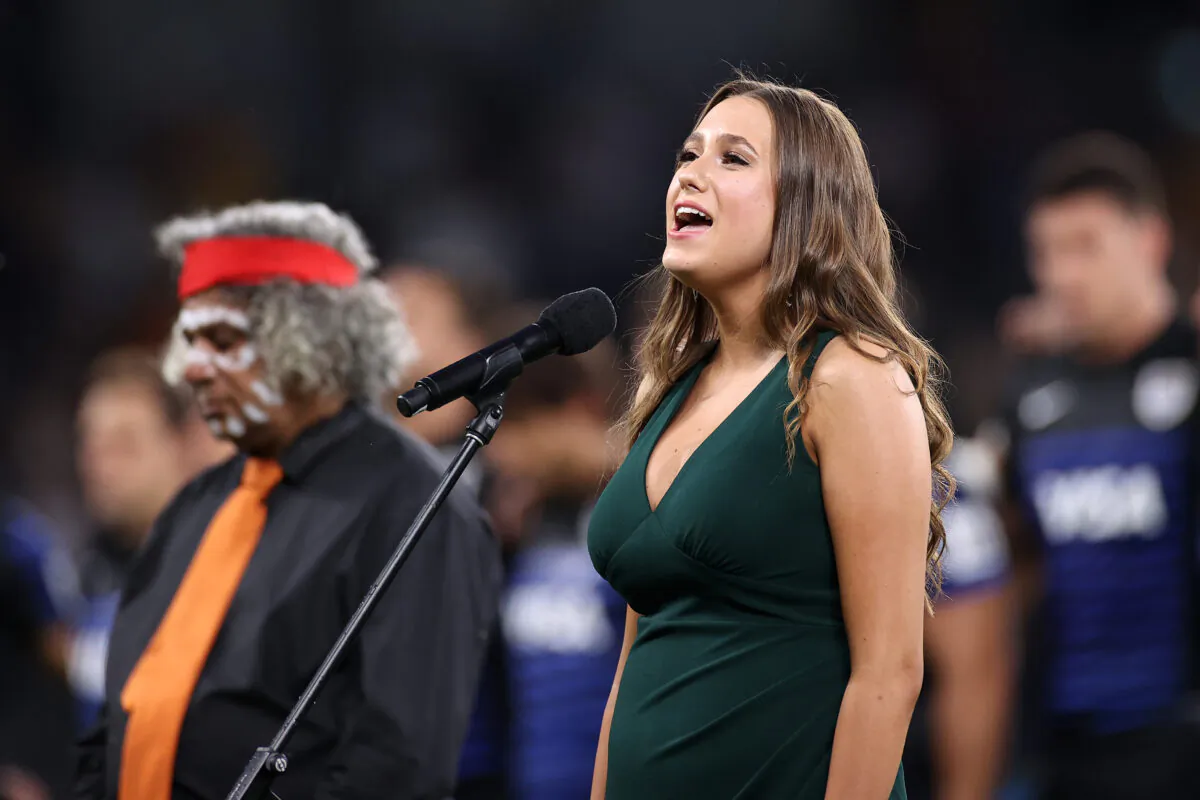 Olivia Fox sings the national anthem during the 2020 Tri-Nations match between the Australian Wallabies and the Argentina Pumas at Bankwest Stadium in Sydney, Australia on Dec. 5, 2020. (Cameron Spencer/Getty Images)