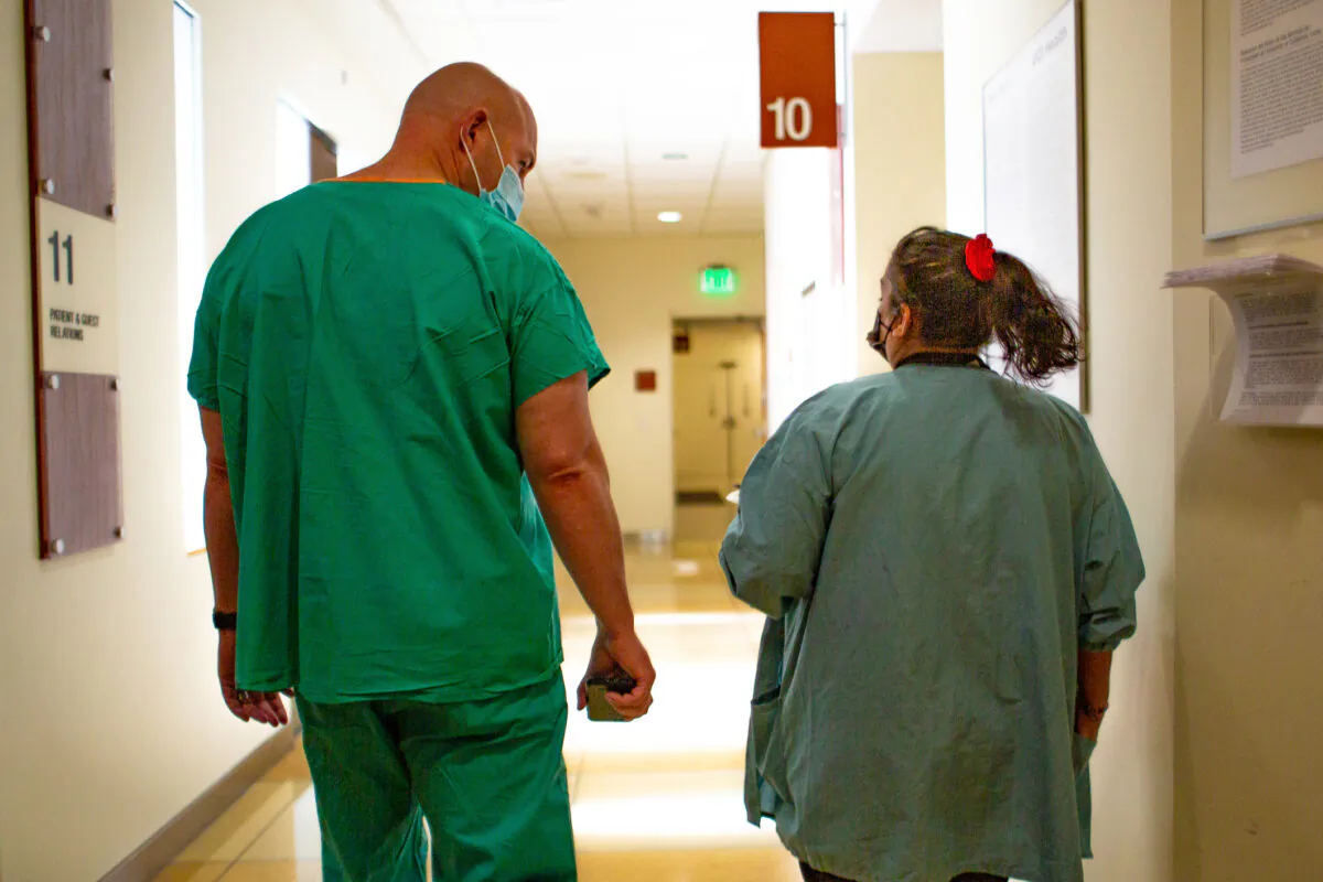 A file photo of medical staff walking through a hospital in Orange County, Calif. (John Fredricks/The EpochTimes)