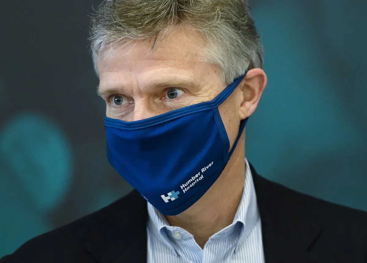 Ontario Finance Minister Rod Phillips looks on as he delivers baked goods and coffee to frontline health workers at Humber River Hospital ahead of the Ontario budget during the COVID-19 pandemic in Toronto on Nov. 5, 2020. (The Canadian Press/Nathan Denette)