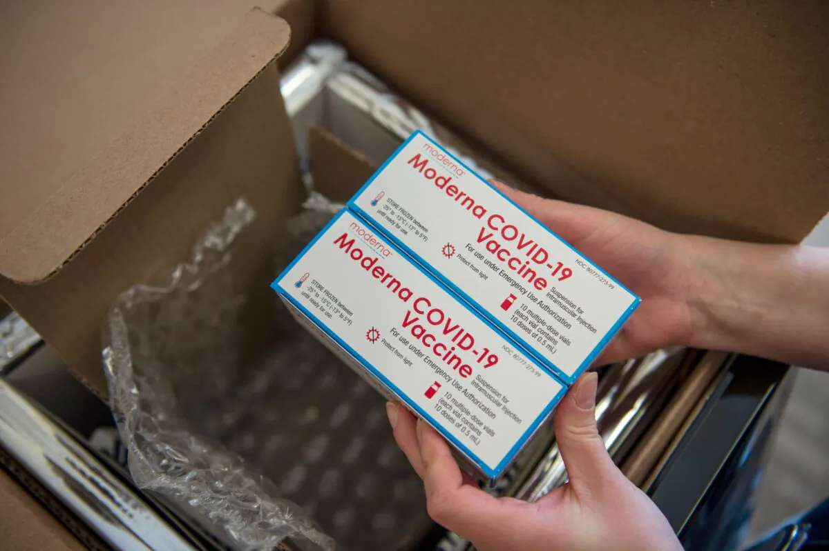 Moderna COVID-19 vaccines are unpacked in Boston, Mass., on Dec. 24, 2020. (Joseph Prezioso/AFP via Getty Images)