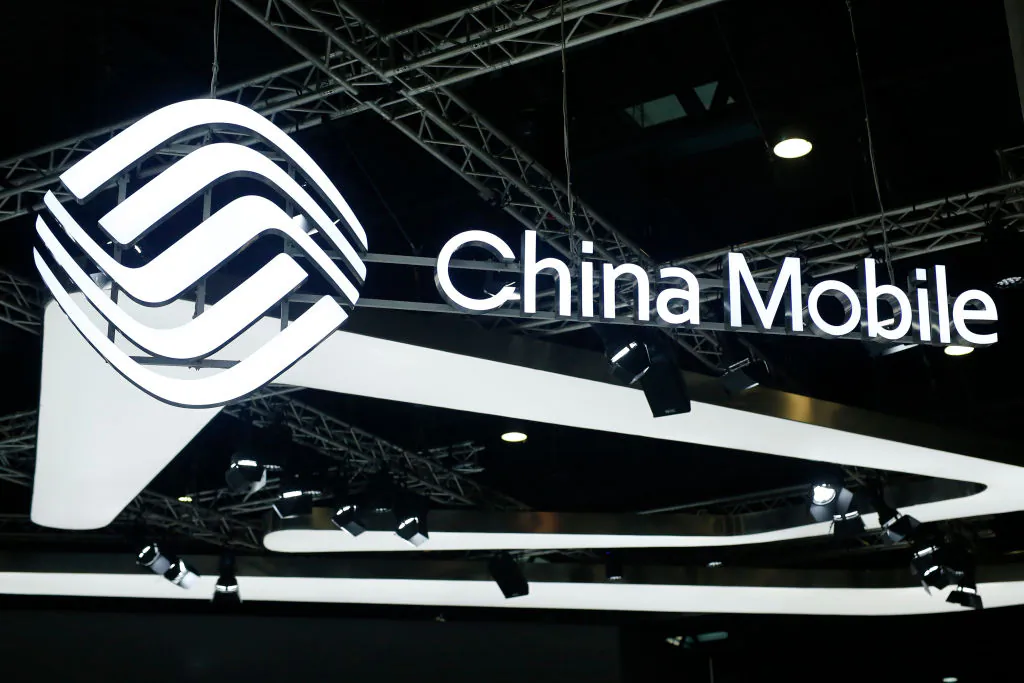 The China Mobile logo is displayed at the Mobile World Congress in Barcelona, Spain, on Feb. 26, 2019. (Pau Barrena/AFP via Getty Images)