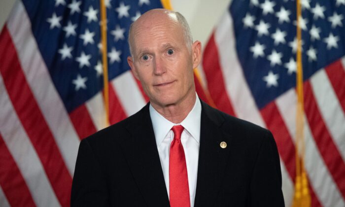 Sen. Rick Scott (R-Fla.) speaks to the media before the weekly Senate Republican lunch on Capitol Hill in Washington, on Nov. 10, 2020. (Saul Loeb/AFP via Getty Images)