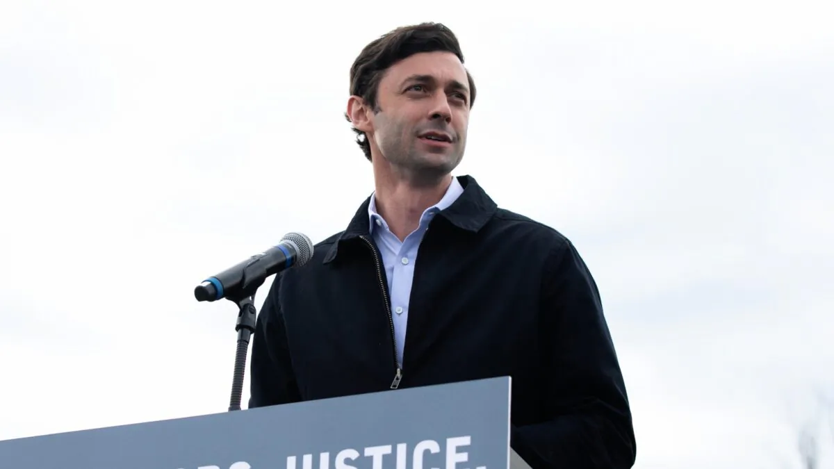 Georgia Democratic Senate candidate Jon Ossoff speaks to the crowd during a "It's Time to Vote" drive-in rally on Dec. 28, 2020 in Stonecrest, Georgia. (Jessica McGowan/Getty Images)