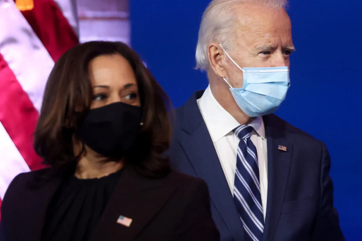 President-elect Joe Biden and Sen. Kamala Harris face reporters during a brief news conference in Wilmington, Del., on Nov. 10, 2020. (Jonathan Ernst   via Reuters)