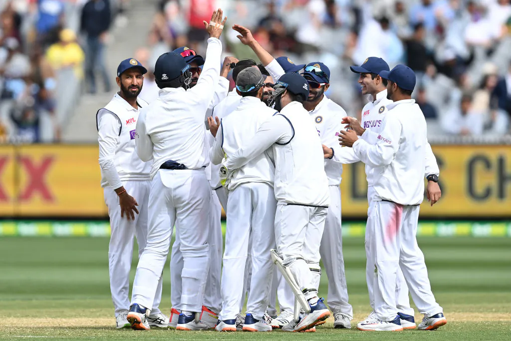 India cricket players celebrate wicket during day three of the Second Test match against Australia at Melbourne Cricket Ground in Melbourne, Australia on Dec. 28, 2020. (Quinn Rooney/Getty Images)