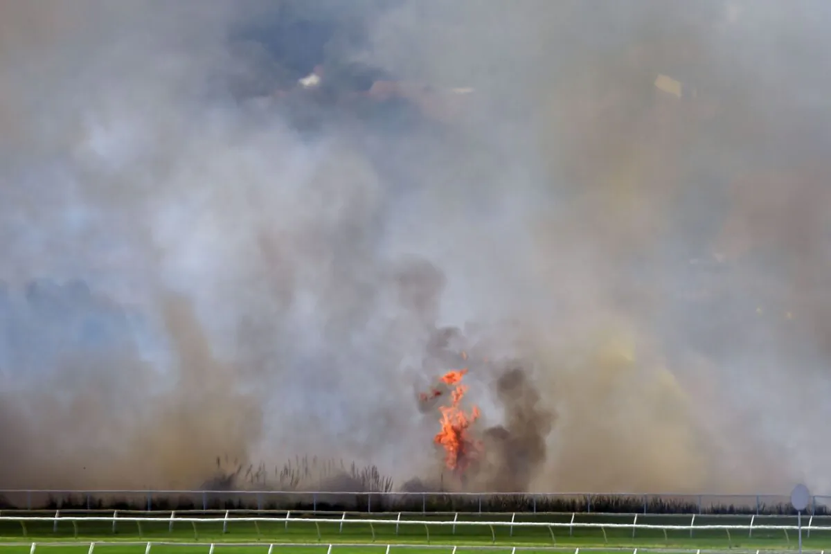 A bushfire burns outside the Perth Cricket Satdium in Perth on December 13, 2019. (Peter Parks AFP via Getty Images)
