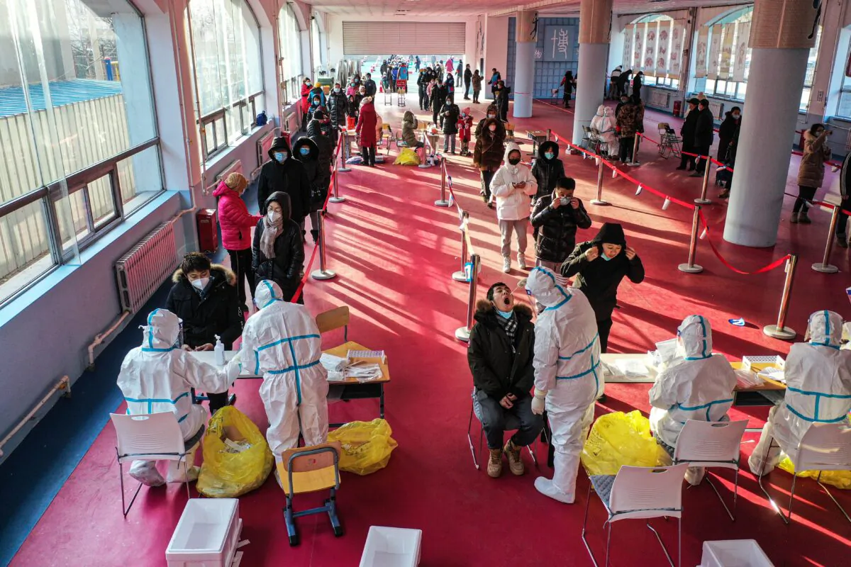 People are lining up for the COVID-19 test in Shenyang city, Liaoning Province, China, on Jan. 2, 2021. (AFP via Getty Images)