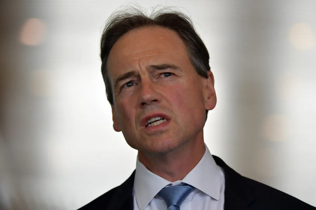 Minister for Health Greg Hunt addresses media during a doorstop in the Mural Hall at Parliament House in Canberra, Australia on Dec.8, 2020. (Sam Mooy/Getty Images)
