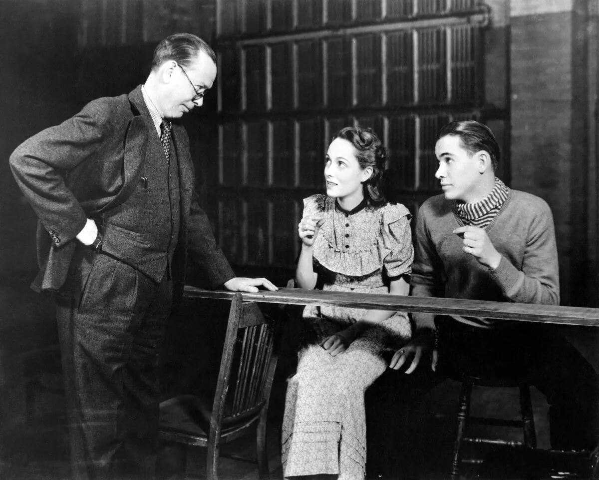 The play "Our Town" captures our shared humanity. A scene from the original Broadway production of “Our Town” with Frank Craven as the Stage Manager, Martha Scott as Emily Webb, and John Craven as George Gibbs. (Public Domain)