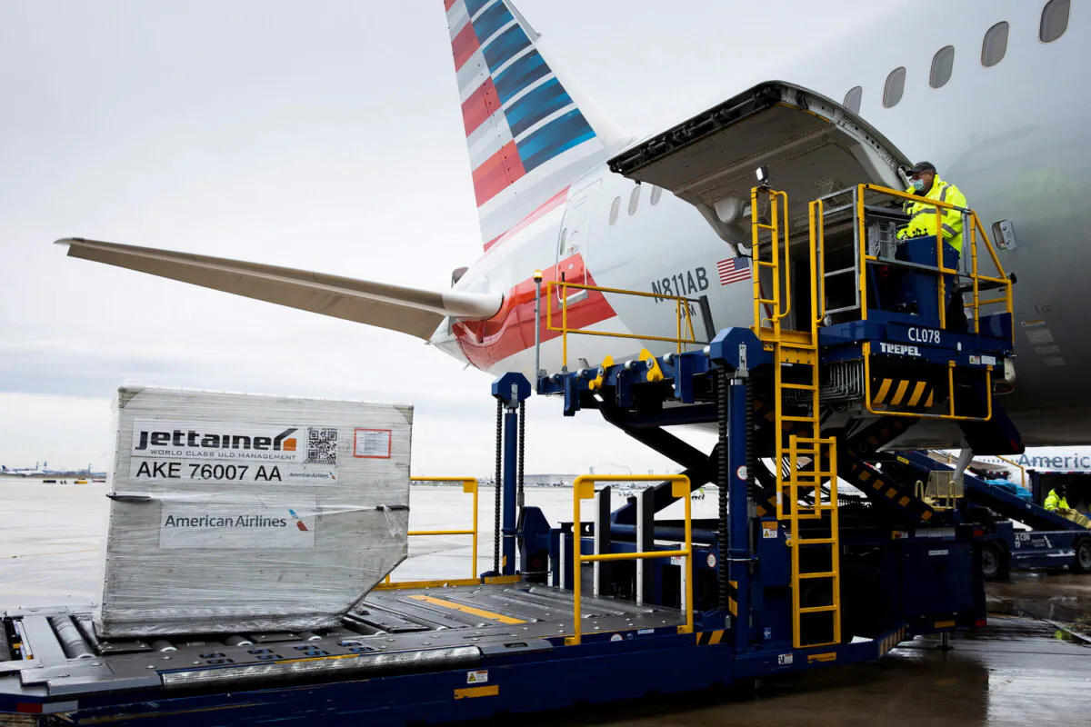 An American Airlines cargo plane is unloaded at Philadelphia International Airport in Philadelphia, on Dec. 4, 2020. (Reuters/Rachel Wisniewski/File Photo)