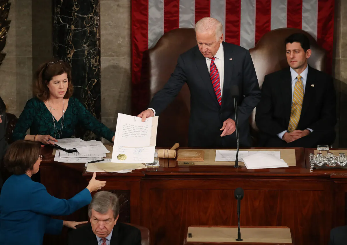 Then-Vice President Joe Biden (C), presides over the counting of the electoral votes from the 2016 presidential election during a joint session of Congress, in Washington on Jan. 6, 2017. (Mark Wilson/Getty Images)