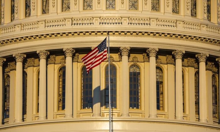 The rising sun illuminates the United States Capitol building in Washington on Sept. 19, 2019. (Samuel Corum/Getty Images)