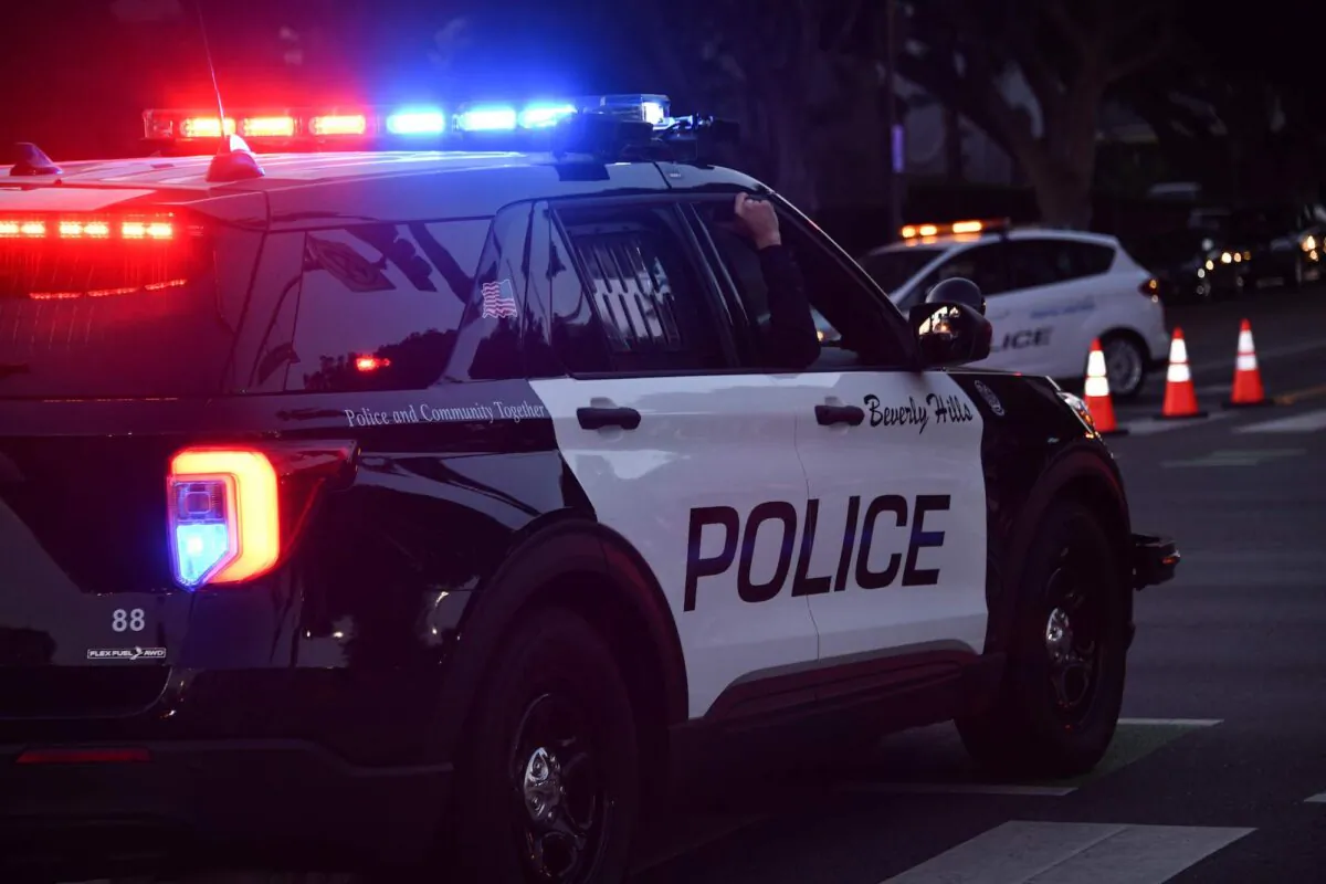 Police officers patrol in their car in Beverly Hills, Calif., on Nov. 1, 2020. (Chris Delmas/AFP via Getty Images)