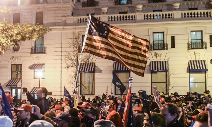 Supporters of President Donald Trump wave a Betsy Ross flag during a protest in Washington on Dec. 12, 2020. (Stephanie Keith/Getty Images)