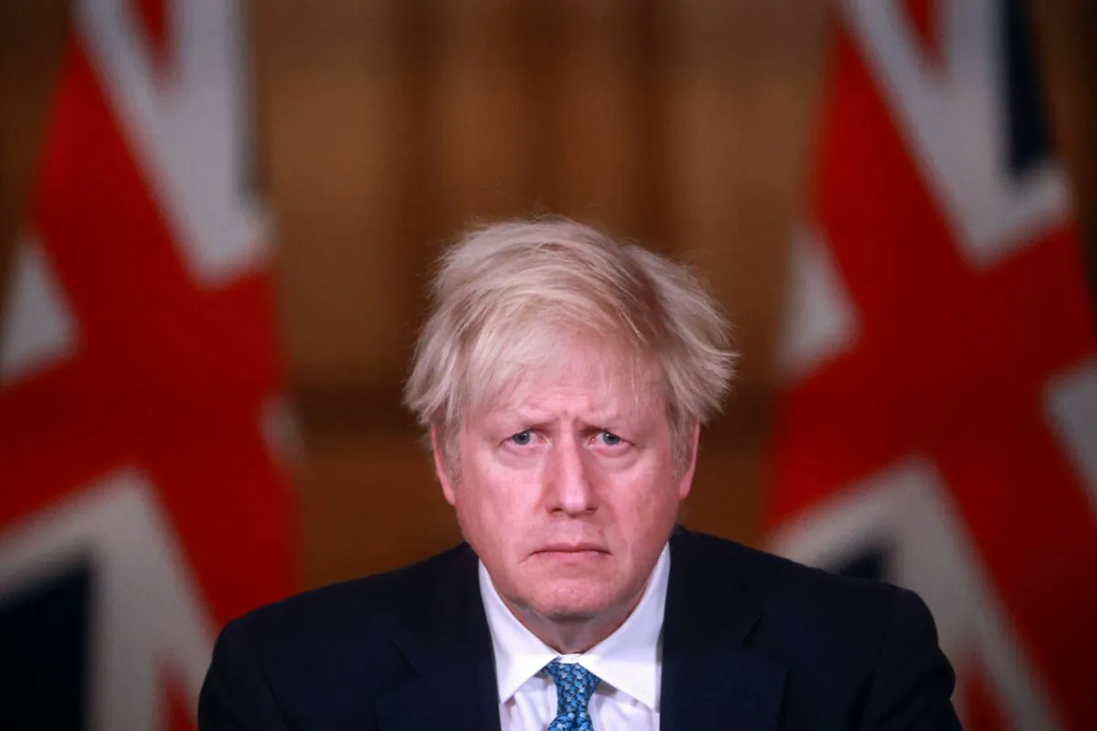 Britain's Prime Minister Boris Johnson takes part in a virtual press conference inside 10 Downing Street in central London following the introduction of a nationwide coronavirus lockdown on Jan 5, 2021. (Hannah Mckay/Pool/AFP via Getty Images)