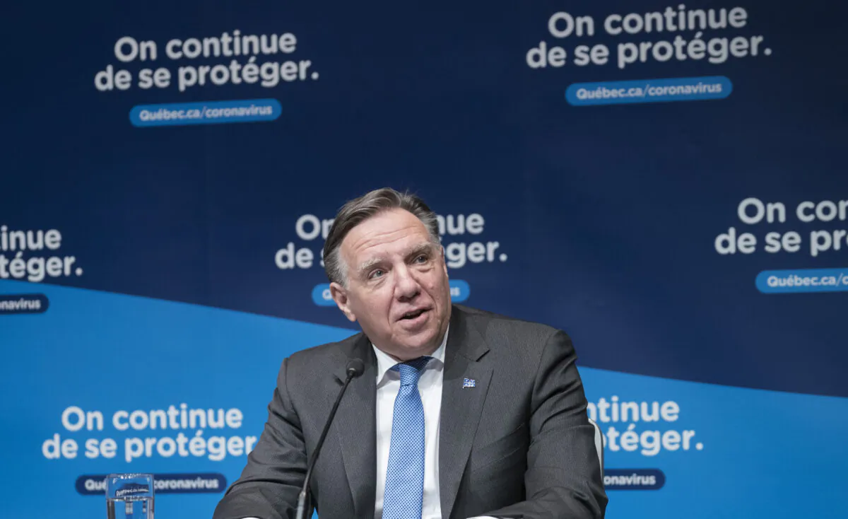 Quebec Premier Francois Legault responds to a question during a news conference in Montreal, Canada, on Dec. 22, 2020. (Paul Chiasson/The Canadian Press)