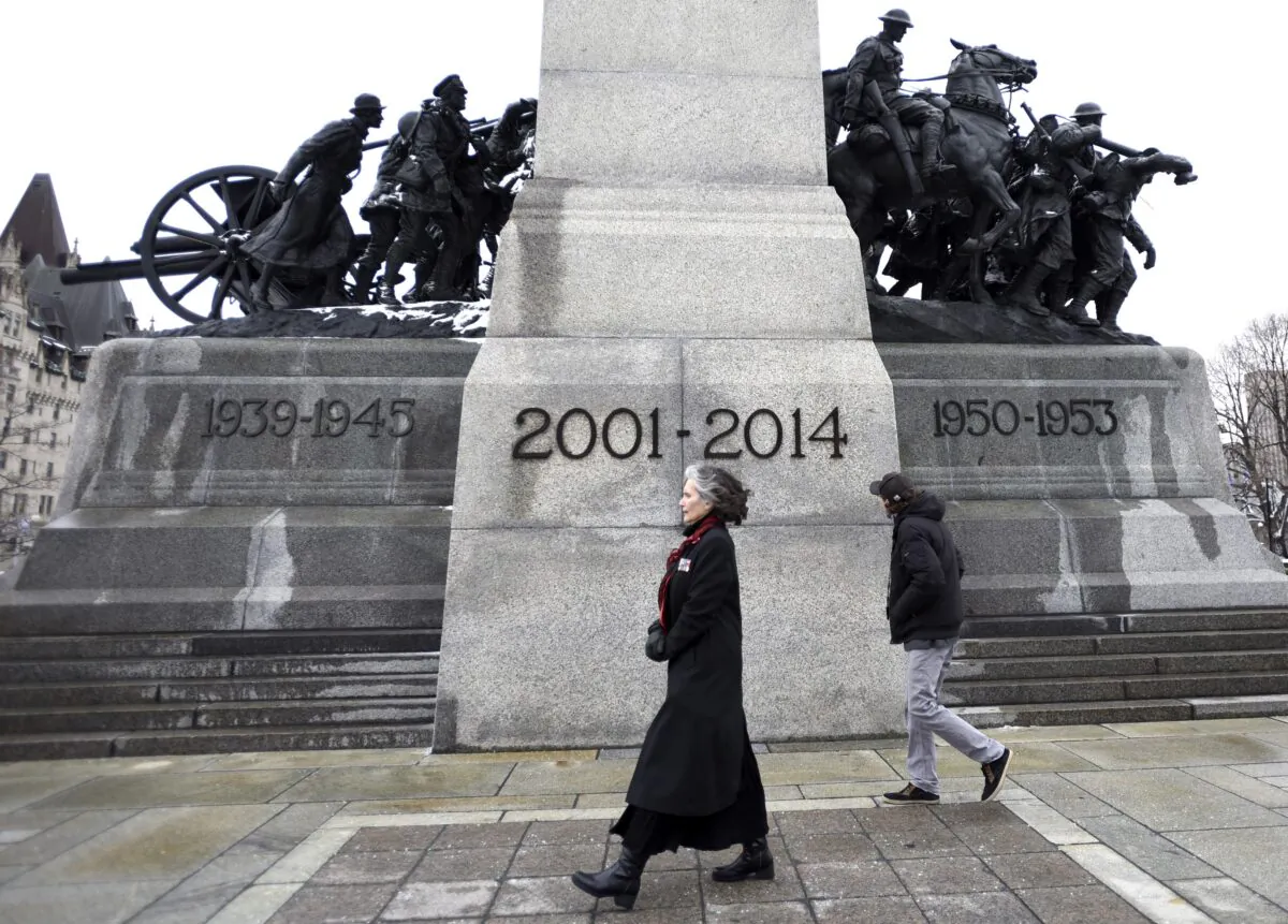 The years of Canada's mission in Afghanistan are seen on the National War Memorial after a ceremony honouring Canadians who served and died during that mission, in Ottawa, Canada, on March 31, 2019. (Justin Tang/The Canadian Press)