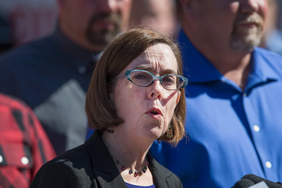 Oregon Gov. Kate Brown speaks to the press in Roseburg, Ore. on Oct. 2, 2015.  (Scott Olson/Getty Images)