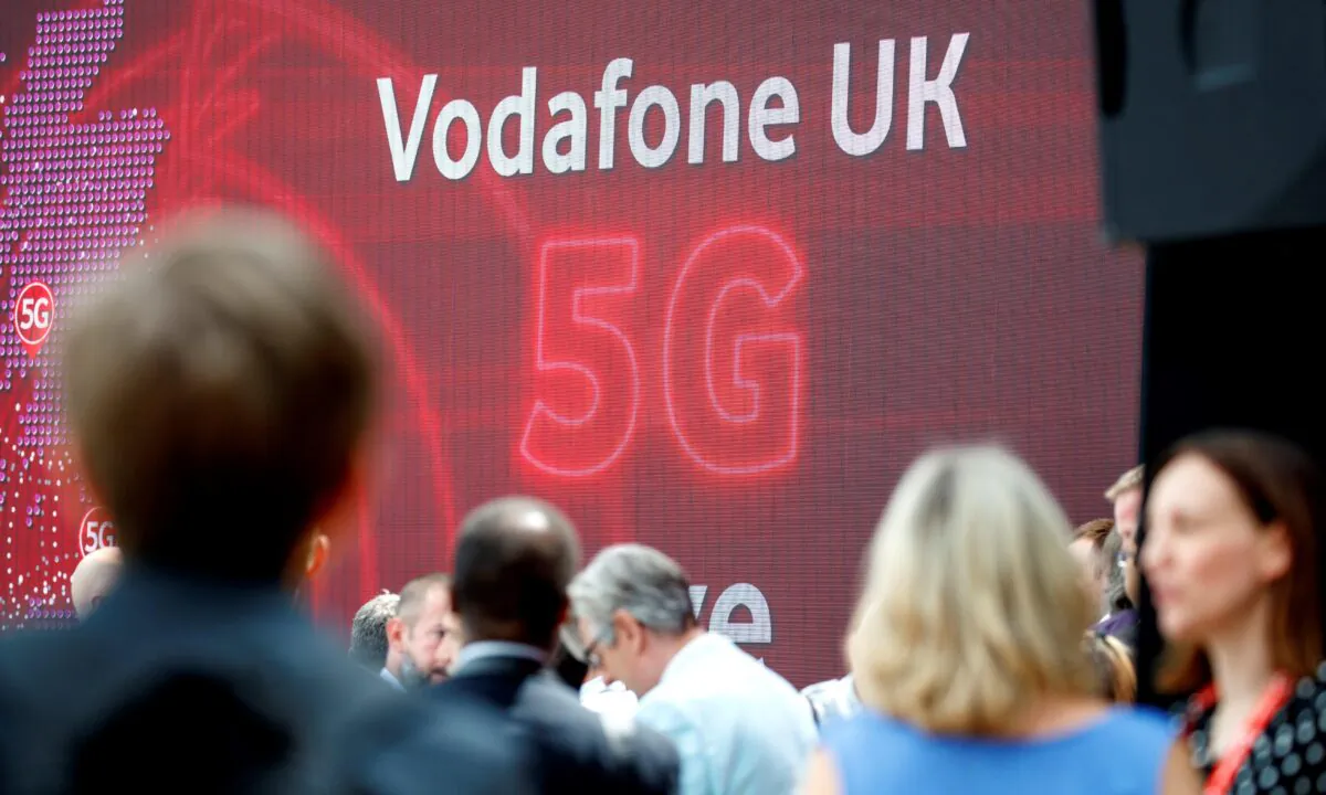 The 5G logo is pictured during the launch of Vodafone UK's 5G mobile data network in London on July 3, 2019. (Tolga Akmen/AFP via Getty Images)