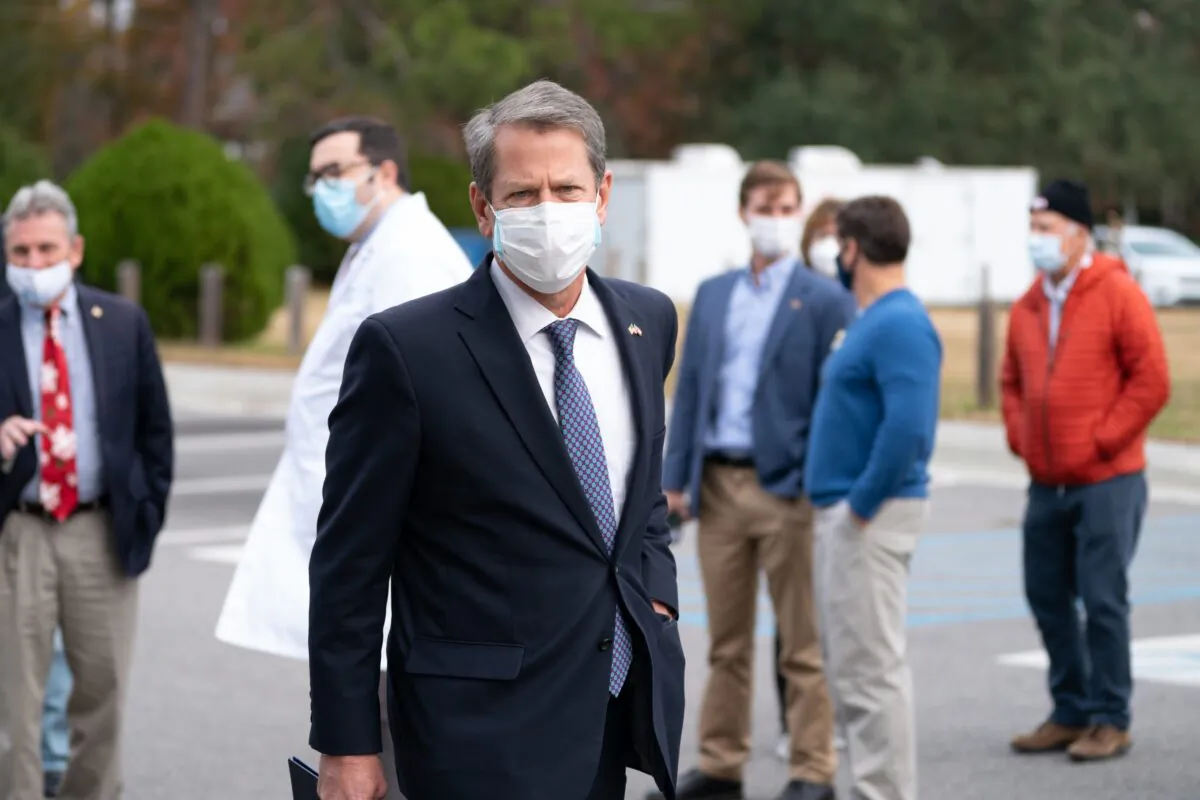 Georgia Gov. Brian Kemp prepares to speak to reporters in Savannah, Ga., on Dec. 15, 2020. (Sean Rayford/Getty Images)